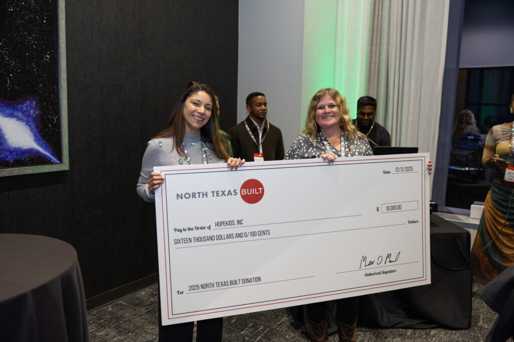 DALLAS, TX - DECEMBER 3: North Texas Built chapter holds their Holiday party at HOAR Construction office on December 3, Dallas, Texas. (Photo by Aric Becker)