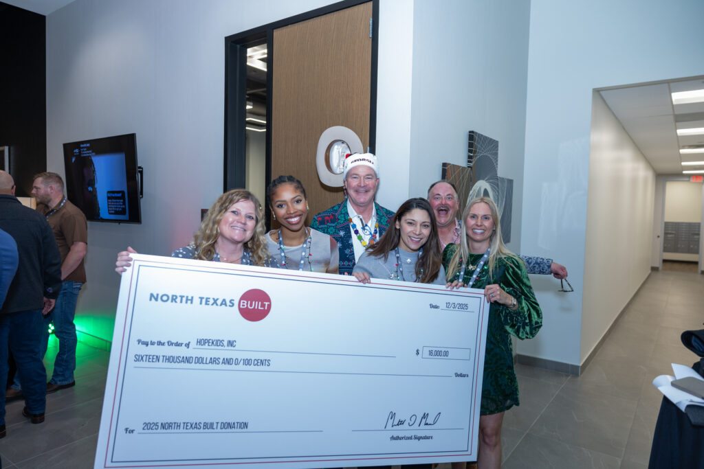 DALLAS, TX - DECEMBER 3: North Texas Built chapter holds their Holiday party at HOAR Construction office on December 3, Dallas, Texas. (Photo by Aric Becker)